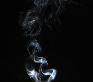 Smoke with a black background. Abstract element to help your design