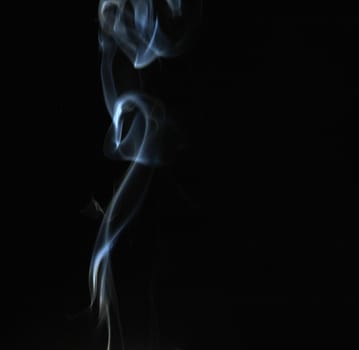 Smoke with a black background. Abstract element to help your design