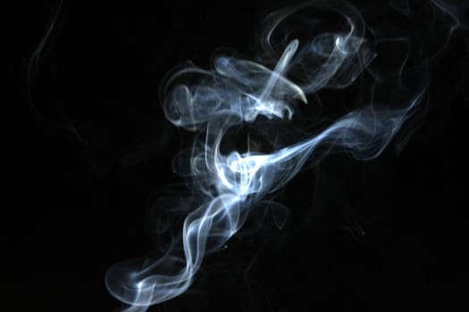 Smoke with a black background. Abstract element to help your design