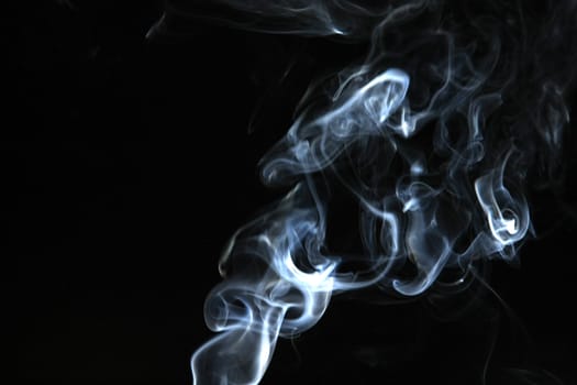 Smoke with a black background. Abstract element to help your design