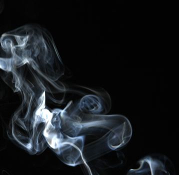 Smoke with a black background. Abstract element to help your design