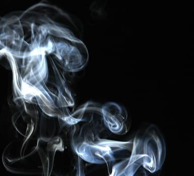 Smoke with a black background. Abstract element to help your design