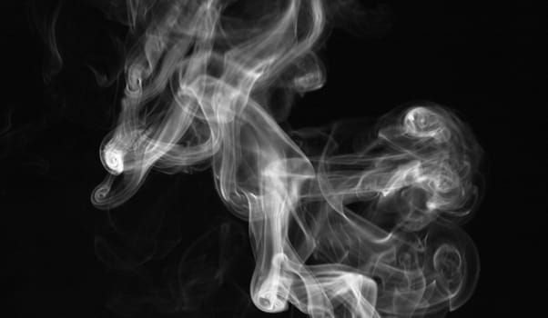 Smoke with a black background. Abstract element to help your design