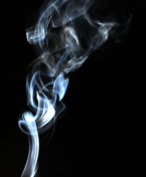 Smoke with a black background. Abstract element to help your design