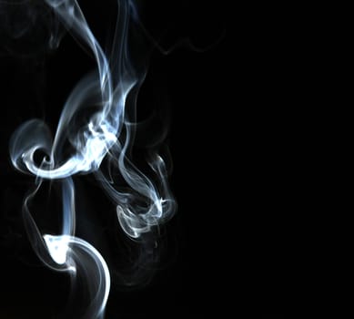 Smoke with a black background. Abstract element to help your design