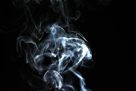 Smoke with a black background. Abstract element to help your design