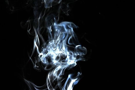 Smoke with a black background. Abstract element to help your design