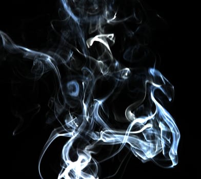 Smoke with a black background. Abstract element to help your design