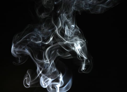 Smoke with a black background. Abstract element to help your design