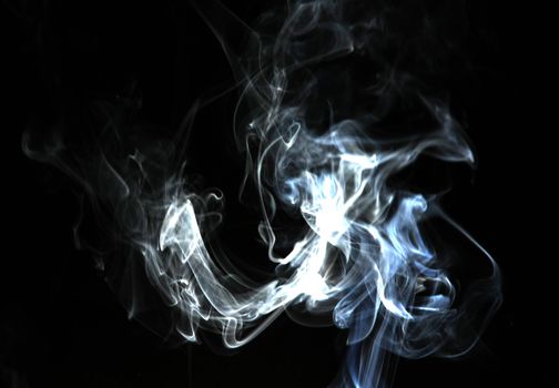 Smoke with a black background. Abstract element to help your design