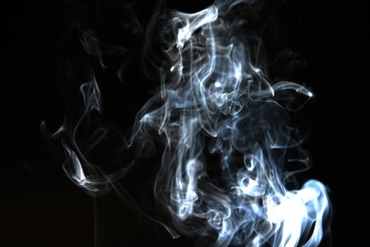 Smoke with a black background. Abstract element to help your design