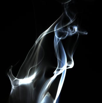 Smoke with a black background. Abstract element to help your design