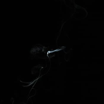 Smoke with a black background. Abstract element to help your design