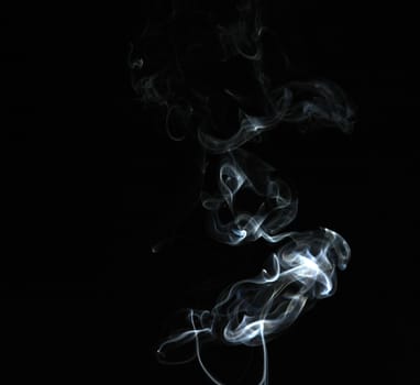 Smoke with a black background. Abstract element to help your design