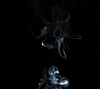 Smoke with a black background. Abstract element to help your design
