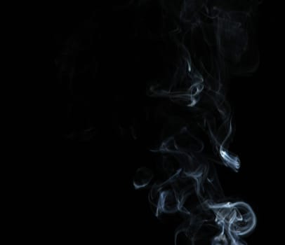 Smoke with a black background. Abstract element to help your design