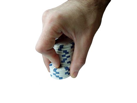 image with a hand making cutting with casino chips