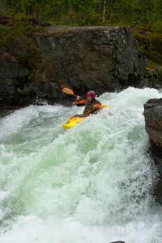 Kayaking. Waterfalls in Norway. July 2010