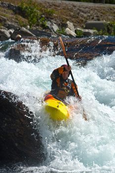 Kayaking. Waterfalls in Norway. July 2010