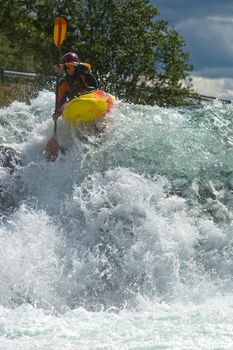 Kayaking. Waterfalls in Norway. July 2010