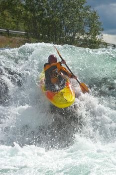 Kayaking. Waterfalls in Norway. July 2010