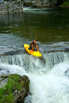 Kayaking. Waterfalls in Norway. July 2010