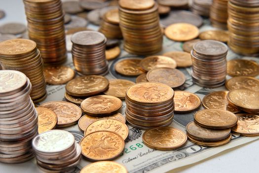 Piles of coins. The concept of cash, savings, finance and business
