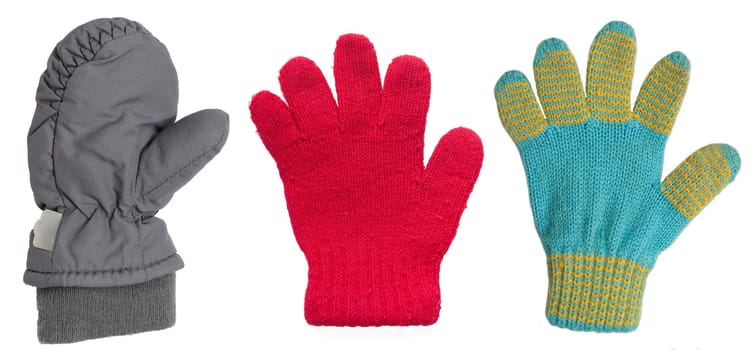 Winter child's mittens of a few kinds are isolated on a white background