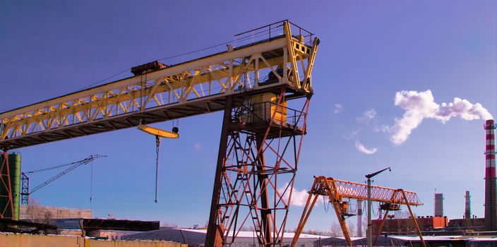 Industrial Landscape: metallurgic production facility with gantry cranes. Russia, Ekaterinburg.