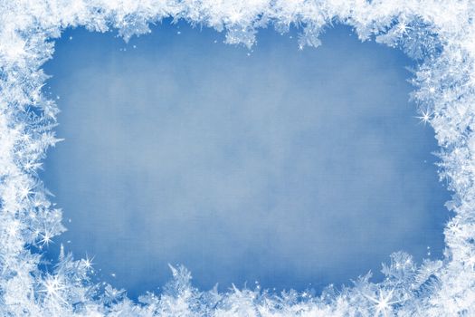 Winter frame of gleaming ice, in the center of the composition aged textured background
