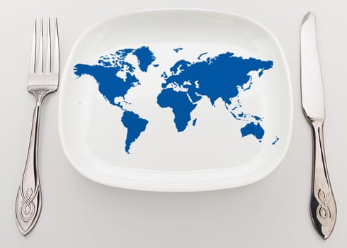 Concept: whole world on the plate. Superiority
