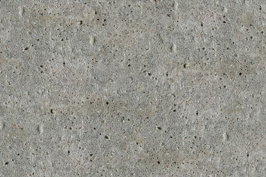The texture of concrete. Uniform illumination. A typical rough uneven surface.