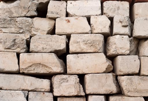 Piles of broken bricks. Images for any designer purposes. The concept of unity, consistency, robustness