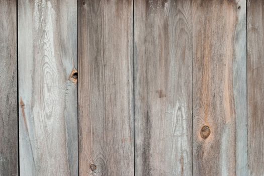 Old wooden blue painted surface. The paint is faded and cracked, you can see small cracks. Uniform illumination and a wide tonal range, sharpness is not increased. For any designer's use, opportunities for marine, coastal theme