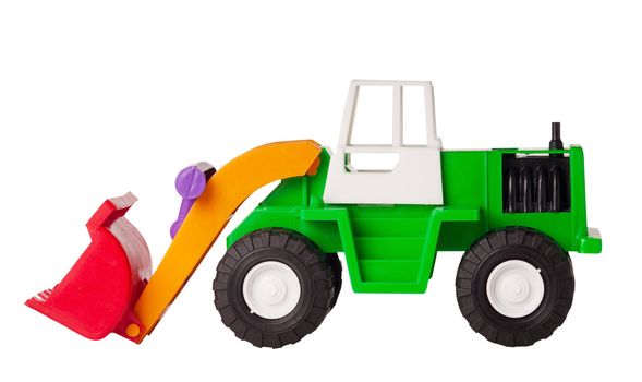 Toy excavator is isolated on a white background, side view