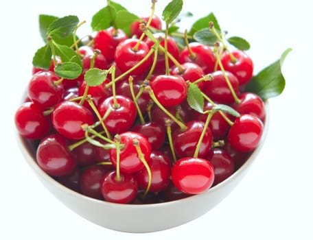 Cherries in a bowl on a white background, a small DOF, cherries in the center