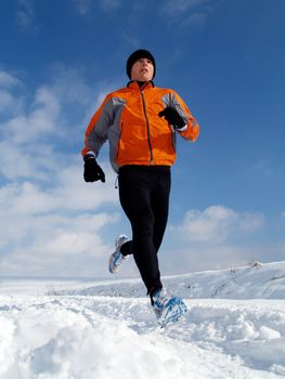 An athlete exercising on a cold winter day
