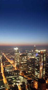 The picture shows the skyline of Frankfurt at night, Germany
