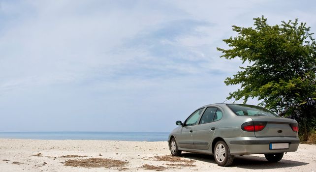 Car parked at the beach, towards sea