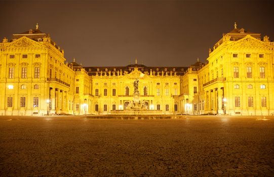 The illuminated Residenz Palace in Würzburg at night, Germany
