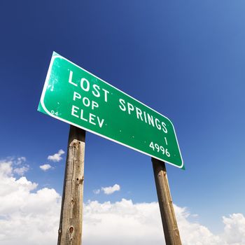 Low angle view of population and elevation sign for Lost Springs, Wyoming.