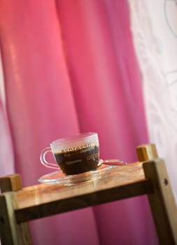 Coffee cup with pink background