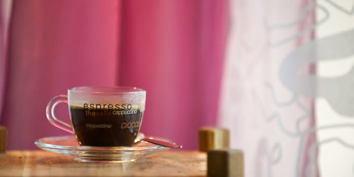 Coffee cup with pink background