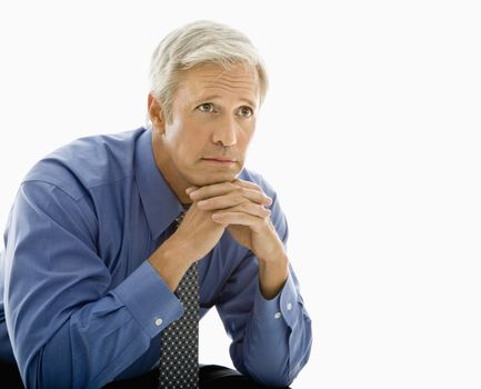 Middle aged Caucasian man with thoughtful expression.