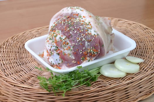 Ham strewed by seasoning with an onions