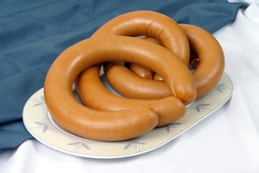 Boiled sausage on a plate