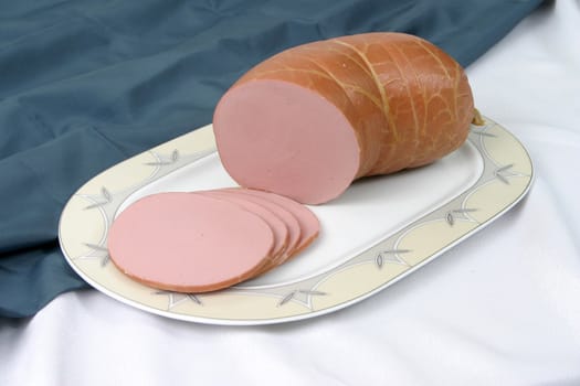 Boiled sausage on a plate