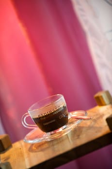 Coffee cup with pink background
