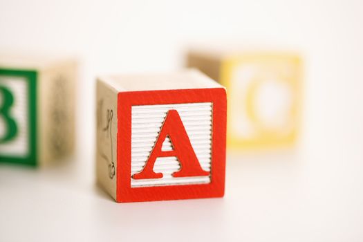 Selective focus of alphabet blocks.