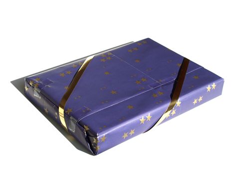 Chrismas gift wrapped in blue paper isolated over white with soft shadow